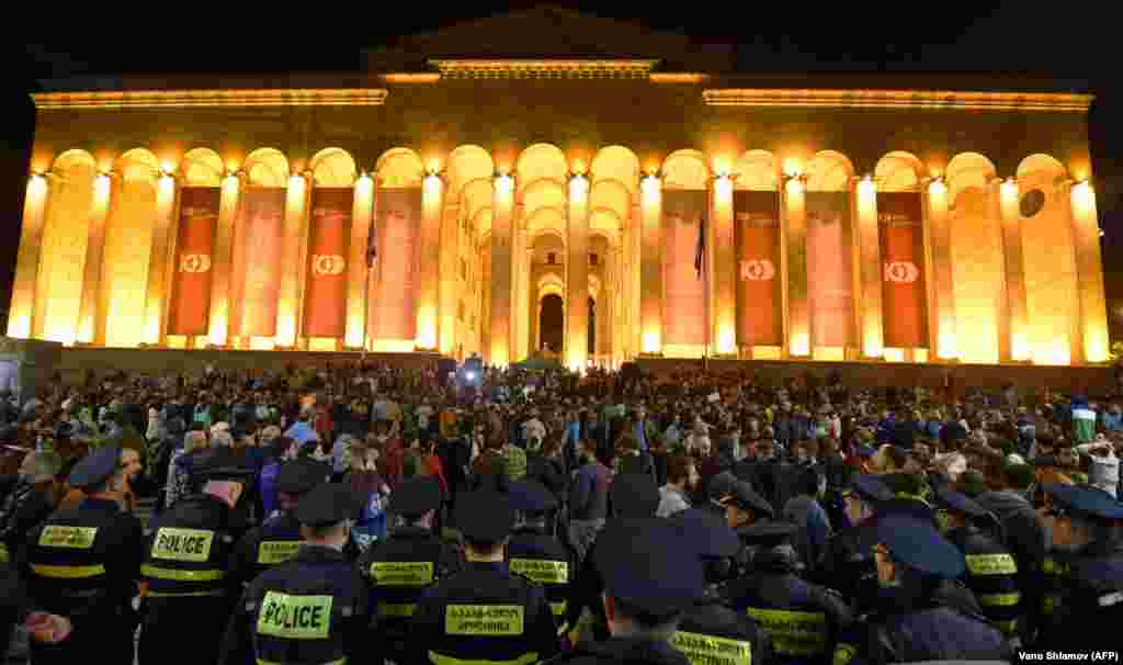 People take part in a rally in Tbilisi against allegedly heavy-handed police raids on two popular nightclubs and the government's harsh drug policy on May 13. (AFP/Vano Shlamov)
