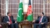 صلاح‌الدین ربانی وزیر خارجه افغانستان (راست) حین ملاقات با شاه محمود قریشی وزیر خارجه پاکستان در کابل