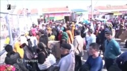 Тамбашавии мардум дар гузаргоҳҳои марзӣ миёни Қирғизистону Узбекистон