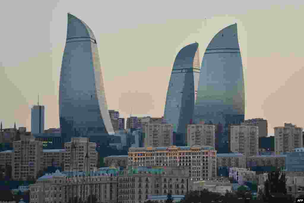 A panoramic daytime view of Baku and the Flame Towers