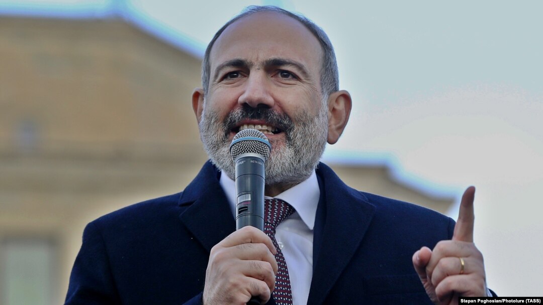 Armenian Prime Minister Nikol Pashinian addresses his supporters during a gathering on Republic Square in Yerevan on February 25.