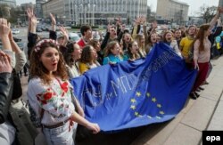 Ukrainian students form a human chain during rally named "Ukraine and Europe are strong together" in downtown Kyiv on April 5.