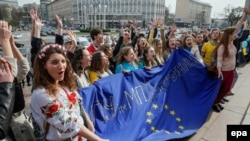 Ukrainian students form a human chain during a rally named "Ukraine and Europe are strong together" in downtown Kyiv on April 5.