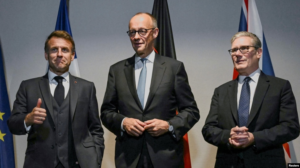 French President Emmanuel Macron, Germany's Chancellor Friedrich Merz, and Britain's Prime Minister Keir Starmer pose for the media at a hotel prior to an E3 meeting on the sidelines of the NATO summit in The Hague, Netherlands, June 24, 2025.