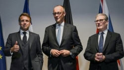 French President Emmanuel Macron, Germany's Chancellor Friedrich Merz, and Britain's Prime Minister Keir Starmer pose for the media at a hotel prior to an E3 meeting on the sidelines of the NATO summit in The Hague, Netherlands, June 24, 2025.