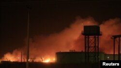 Fire engulfs the Yarmouk ammunition factory in Khartoum overnight on October 23-24.