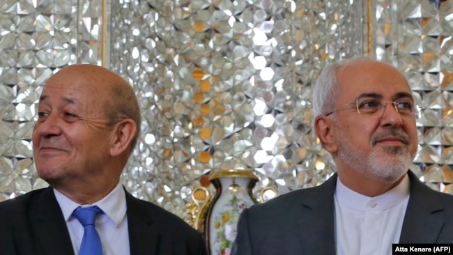 IRAN -- Iranian Foreign Minister Mohammad Javad Zarif (R) meets with French Foreign Minister Jean-Yves Le Drian in the capital Tehran, March 5, 2018