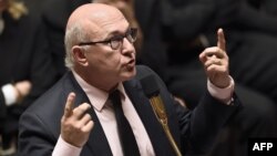 "The undermining of the chancellor is not something we can accept," French Finance Minister Michel Sapin said.