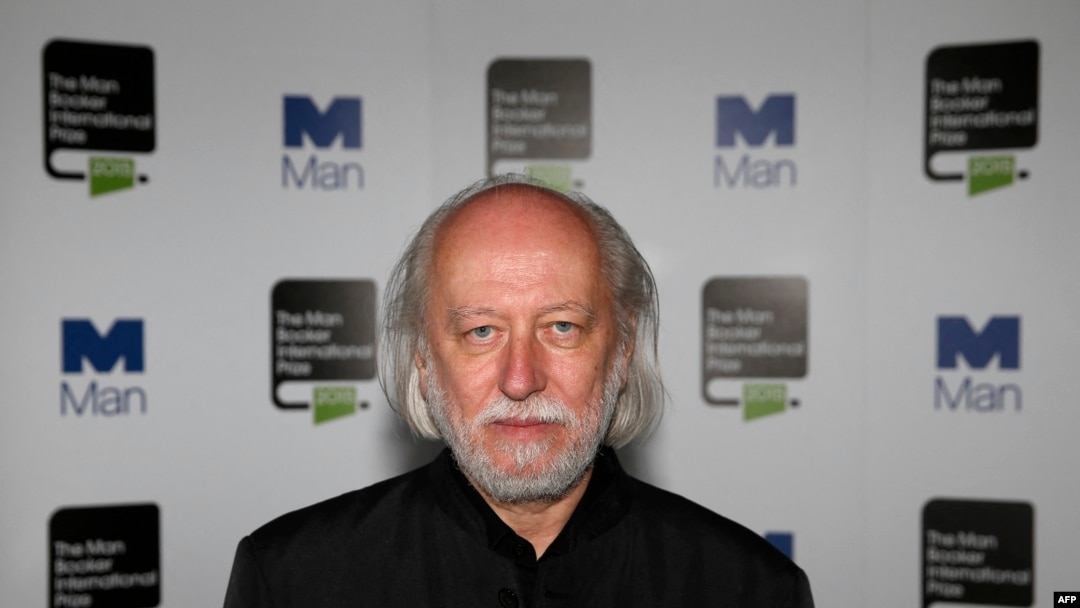 Ешек пен әйел сидит