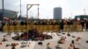 People demonstrate against the speech of Iranian Justice Minister Seyyed Alireza Avayi at the Human Rights Council, in front of the United Nations in Geneva, in February.