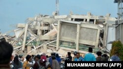 Индонезия, город Паллу, разрушения после подземных толчков 28 сентября 2018
