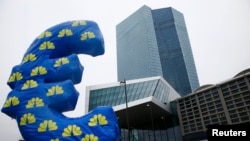 Inflated euro currency sign outside the headquarters of the European Central Bank in Frankfurt