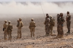 Йорданські вояки та американські піхотинці під час маневрів «Eager Lion». Травень 2015 року