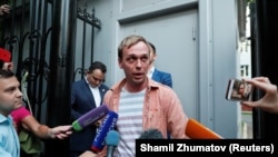 Ivan Golunov talks to the press after being released on June 11.