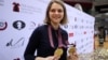 Anna Muzychuk celebrates after winning two gold medals in the World Chess Rapid and Blitz Championships 2016 in Doha in December 2016.