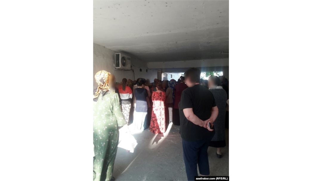 Images the government doesn't want to get out: People wait in line for subsidized food in Ashgabat.
