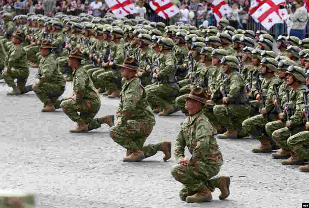 Georgian troops take part in a military parade marking the country's Independence Day in Tbilisi on May 26. (epa/Zurab Kurtsikidze)