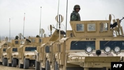 Afghanistan -- A convoy of Afghan National Army lined up in formation at the Kabul Military Training Center, 16Jan2011