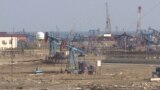 Azerbaijan - oil rigs near Caspian Sea in Baku - story on pollution - video screen grab