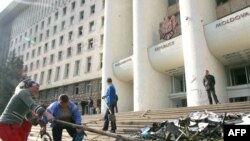 Cleaning up in front of the presidential building in Chisinau on April 8, 2009