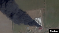 Smoke rises from an oil depot in Russia's southwestern Rostov region after an air strike in August.