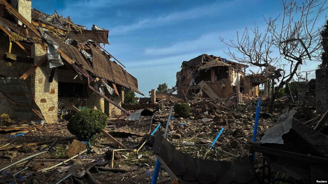 Residential buildings damaged during a Russian missile strike are seen in the Kyiv region on June 23.