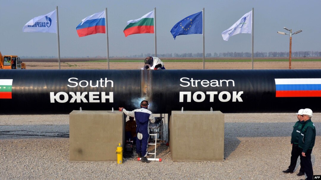 Workers weld pipes during the symbolic start of the construction of the Bulgarian section of the South Stream pipeline near the Bulgarian village of Rasovo on October 31, 2013.