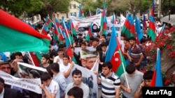 Azerbaijanis rally in front of the Iranian Embassy in downtown Baku on May 11.