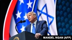 US President Donald Trump addresses the Israeli American Council National Summit 2019 at the Diplomat Beach Resort in Hollywood, Florida on December 7, 2019. 