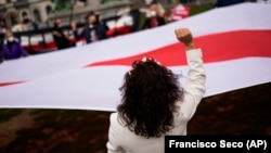 
Protest al susținătorilor opoziției din Belarus, Bruxelles, martie 2021.