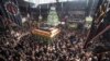 Iran -- Shi'ite Muslims beat themselves as they walk around a symbolic tomb at a mosque during a religious festival marking Ashura, near Tehran's grand bazaar October 24, 2015. 