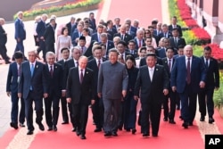  Руският президент Владимир Путин, китайският президент Си Дзинпин, севернокорейският водач Ким Чен Ун и други в Пекин, 3 септември 2025 година В задната част на фотографията се вижда и Зафиров. 