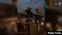 Iran-- Video grab from one of the "Girls of Revolution street" in Tehran, Maryam Shariatmadari, 2018.