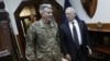 U.S. Defense Secretary James Mattis (right) and Army General John Nicholson, commander of U.S. forces in Afghanistan, speak in Kabul in April.