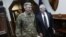 U.S. Defense Secretary James Mattis, right, and U.S. Army General John Nicholson, commander of U.S. Forces Afghanistan, arrive to meet with an Afghan defense delegation at Resolute Support headquarters in Kabul on April 24.