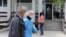 Kosovo: A man wearing a mask is seen near the Clinical Center in Kosovo. 