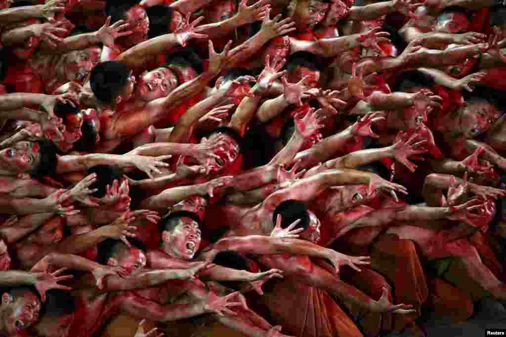 Dancers perform at a gala show to mark the 70th anniversary of the end of World War II in Beijing on September 3. (Reuters/Kim Kyung-Hoon)