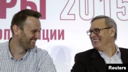Российские оппозиционеры Алексей Навальный и Михаил Касьянов