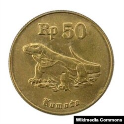 Комод «ажыдаарынын» сүрөтү чегилген Индонезия рупийинин монетасы.