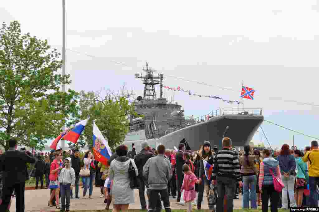 The ship Kaliningrad, part of the Russian Black Sea Fleet, lands in Kerch, Crimea, during Victory Day celebrations.
