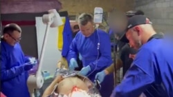 'Save His Leg': Ukrainian Medics Scramble To Save Lives