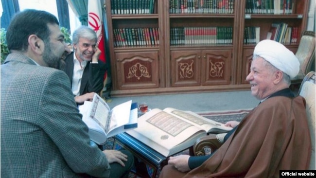 From right to left: Former president Akbar Hashemi Rafsanjani, Sadegh Kharazi and Abbas Iravani, suspect of corruption presenting a rare Quran, undated.