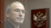 Михаил Ходорковский: за стеклом от правосудия. Фото 2010 года