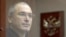 Михаил Ходорковский: за стеклом от правосудия. Фото 2010 года