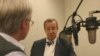 Estonian President Toomas Hendrik Ilves is interviewed by RFE/RL correspondent Charles Recknagel at Prague's new broadcast headquarters on May 12.