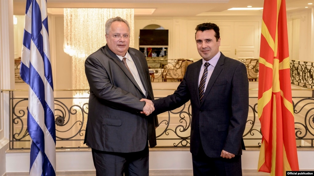Macedonia Prime Minister Zoran Zaev (right) with Greek Foreign Minister Nikos Kodzias in August 