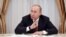 Російський президент Володимир Путін зустрічається у Кремлі з іншими кандидатами на президентську посаду 19 березня 2018 року, наступного дня після президентських виборів