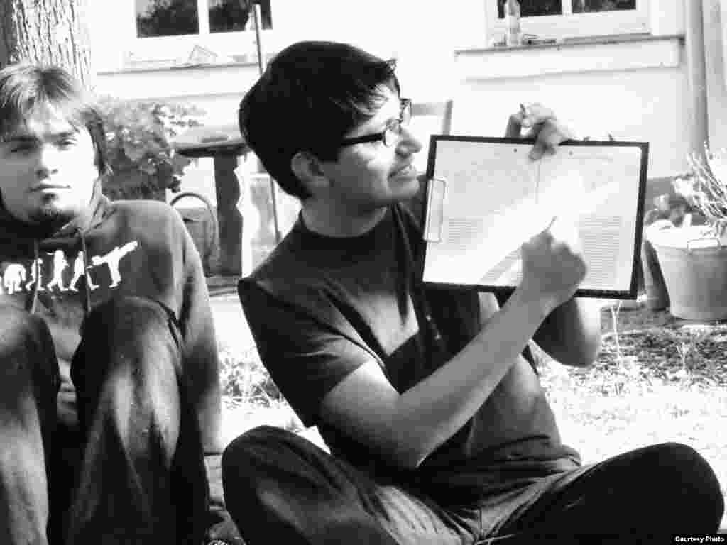 Pedram Shahyar, a member of the Network of Young Iranians in Berlin, planning with the group.