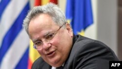 Грчкиот министер за надворешни работи Никос Коѕијас во посета на Македонија во март, годинава