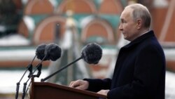 Russian President Vladimir Putin delivers a speech during a military parade on Victory Day in Moscow's Red Square on May 9.